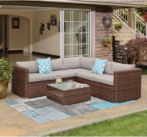 4-Piece Outdoor Furniture Set All-Weather Brown Wicker Sectional Sofa W Warm Gray Thick Cushions, Glass Coffee Table, 2 Teal Pattern Pillows